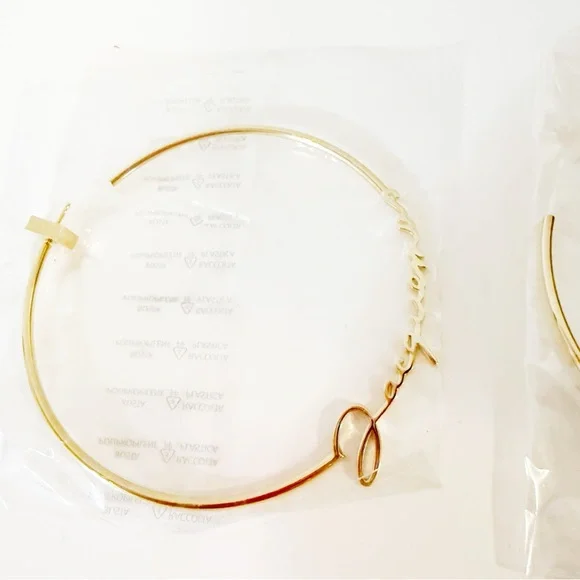 NEW Jacquemus Gold Cursive Script Logo Open Large Hoop Earrings $350 MSRP - Picture 9 of 12